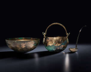TWO BRONZE BOWLS AND A LADLE