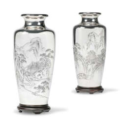 A PAIR OF JAPANESE SILVER VASES
