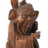 Holzschnitzerei - alter Mann mit Pfirsi - Foto 2