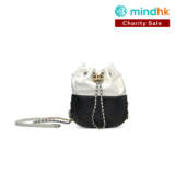 A WHITE & BLACK QUILTED CALFSKIN LEATHER GABRIELLE BUCKET BAG WITH GOLD, SILVER & RUTHÉNIUM HARDWARE - photo 1