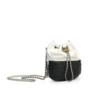 A WHITE & BLACK QUILTED CALFSKIN LEATHER GABRIELLE BUCKET BAG WITH GOLD, SILVER & RUTHÉNIUM HARDWARE - photo 2
