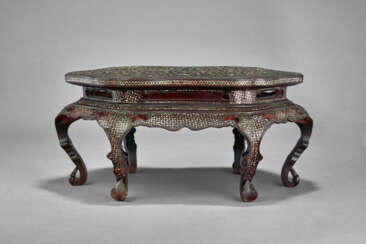 A MOTHER-OF-PEARL INLAID LACQUER TABLE