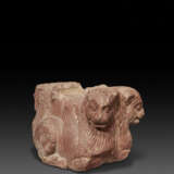 A RARE MOTTLED RED SANDSTONE LION CAPITAL - photo 1