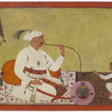 A PORTRAIT OF A RULER SMOKING A HOOKAH - фото 1