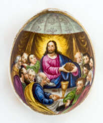 A RUSSIAN PORCELAIN EASTER EGG SHOWING THE LAST SUPPER