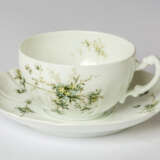 A RUSSIAN PORCELAIN CUP AND SAUCER WITH FLORAL MOTIFS - photo 1