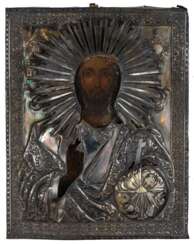 A RUSSIAN ICON WITH SILVER OKLAD SHOWING CHRIST PANTOKRATOR