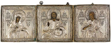 A LARGE RUSSIAN TRIPTYCH WITH SILVER OKLADS SHOWING THE DEESIS