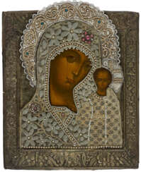 A RUSSIAN ICON WITH ELABORATELY EMBROIDERED RIZA SHOWING THE MOTHER OF GOD KAZANSKAYA