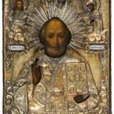 A RUSSIAN ICON WITH SILVER OKLAD SHOWING ST. NICHOLAS - фото 1