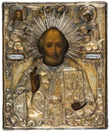 A RUSSIAN ICON WITH SILVER OKLAD SHOWING ST. NICHOLAS - фото 1