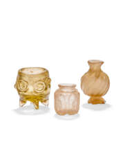 A FATIMID GLASS CUP AND TWO GLASS BOTTLES