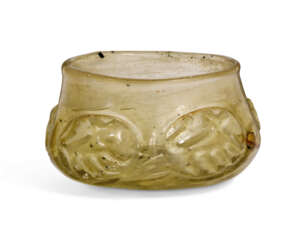 A FATIMID ROUNDED GLASS BOWL