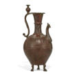 AN EARLY ISLAMIC BRONZE EWER - Auktionsarchiv