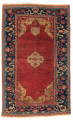 A DOUBLE-NICHE MEDALLION USHAK RUG