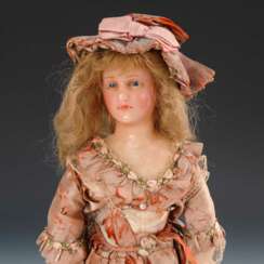 Modedame mit Wachskopf.
