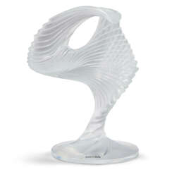 A RARE LALIQUE 'TROPHEE' SWIRLED SKATING CRYSTAL SCULPTURE