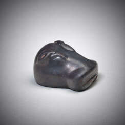 AN EGYPTIAN HEMATITE WEIGHT IN THE FORM OF A HIPPOPOTAMUS HEAD