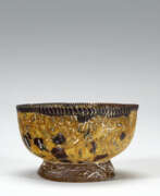 Verre mosaïque. A GREEK YELLOW MOSAIC GLASS FOOTED BOWL