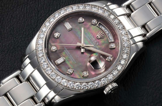 ROLEX, DAY-DATE REF. 18946, A PLATINUM AND DIAMOND-SET WRISTWATCH WITH BLACK MOTHER-OF-PEARL DIAL - photo 1