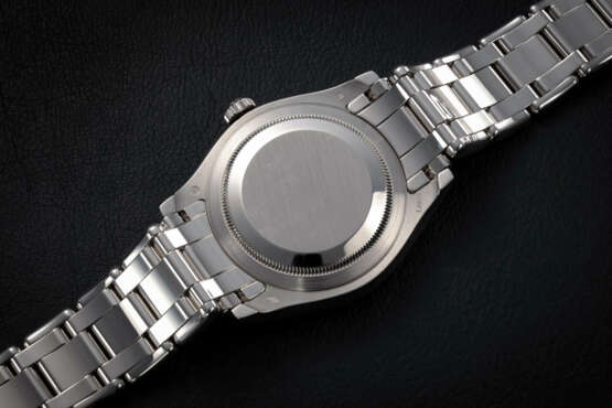 ROLEX, DAY-DATE REF. 18946, A PLATINUM AND DIAMOND-SET WRISTWATCH WITH BLACK MOTHER-OF-PEARL DIAL - photo 3