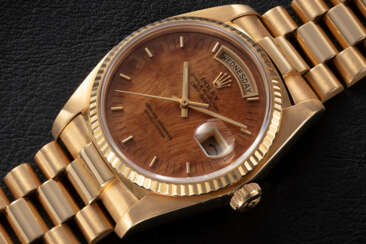 ROLEX, DAY-DATE, REF. 18038, A GOLD AND RUBY-SET AUTOMATIC WRISTWATCH