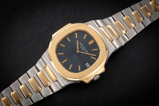 PATEK PHILIPPE, NAUTILUS REF. 3700/11 JA, A STEEL AND GOLD AUTOMATIC WRISTWATCH - фото 2