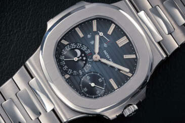 PATEK PHILIPPE, NAUTILUS REF. 5712A, A STEEL AUTOMATIC WRISTWATCH WITH MOON PHASE 