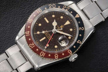 ROLEX, GMT-MASTER REF. 6542 ‘BAKELITE’, A RARE STEEL AUTOMATIC TWO TIME WRISTWATCH 