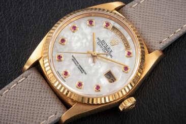 ROLEX, DAY-DATE, REF. 18038, A GOLD AND RUBY-SET AUTOMATIC WRISTWATCH