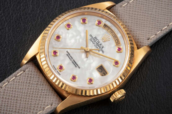 ROLEX, DAY-DATE, REF. 18038, A GOLD AND RUBY-SET AUTOMATIC WRISTWATCH - фото 1