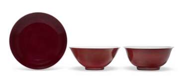 A RED-ENAMELED BOWL AND A RED-GLAZED BOWL