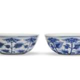 A PAIR OF BLUE AND WHITE CUPS - photo 1