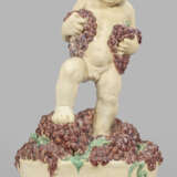 Bacchusknabe mit Weintrauben als kleine Brunnenfigur - Foto 1