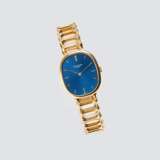 Patek Philippe & Co. Herren-Armbanduhr 'Golden Ellipse Blue Dial' mit Gold-Armband. - фото 1