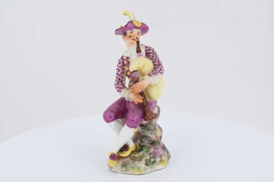 Porcelain figurine of a packpipe player - photo 2