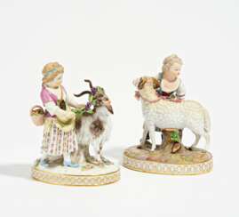 Girl with billy goat and girl with sheep