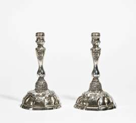 Pair of candlesticks with vine and flower décor
