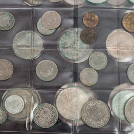 Fundgrube mit Münzen aus aller Welt - - Foto 3