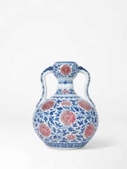 AN EXTREMELY RARE BLUE AND WHITE AND COPPER-RED DECORATED &#39;LOTUS&#39; DOUBLE-GOURD VASE