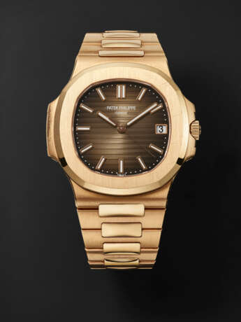 PATEK PHILIPPE, PINK GOLD "NAUTILUS" REF. 5711/1R-001 - photo 1