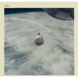 THE GEMINI VII SPACECRAFT OVER THE EARTH AND CLOUDS, DECEMBER 15-16, 1965; ONE OF THREE RENDEZVOUS PHOTOS - photo 2