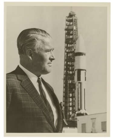 DR. WERNHER VON BRAUN STANDING IN FRONT OF A SATURN 1B ROCKET, 1965 - photo 2