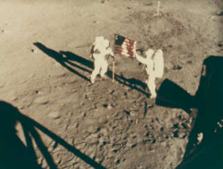 THE ASTRONAUTS PLANTING THE AMERICAN FLAG ON THE LUNAR SURFACE, JULY 16-24, 1969