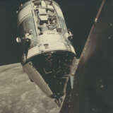 THE COMMAND MODULE AMERICA BEFORE DOCKING WITH THE LM CHALLENGER IN LUNAR ORBIT, DECEMBER 7-19, 1972 - photo 1