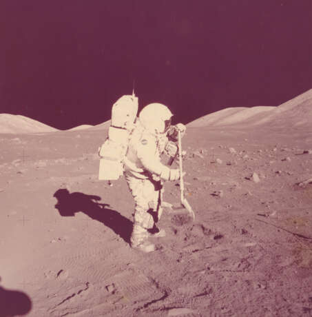 HARRISON SCHMITT HOLDING THE LUNAR RAKE, STATION 1, DECEMBER 7-19, 1972, EVA 1 - photo 1