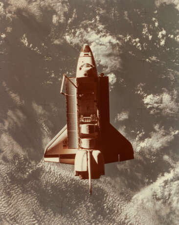 SPACE SHUTTLE DISCOVERY WITH ITS PAYLOAD DOORS OPEN, MARCH 1989 - photo 1