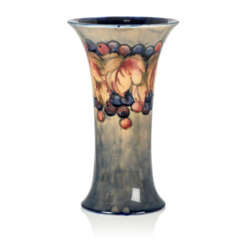 A WILLIAM MOORCROFT &#39;LEAF AND BERRY&#39; VASE