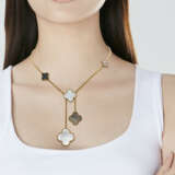 VAN CLEEF & ARPELS MOTHER-OF-PEARL AND ONYX 'MAGIC ALHAMBRA' NECKLACE, BRACELET AND EARRINGS SUITE - photo 2