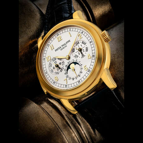 PATEK PHILIPPE. A RARE 18K GOLD AUTOMATIC “CATHEDRAL” MINUTE REPEATING PERPETUAL CALENDAR WRISTWATCH WITH MOON PHASES, 24 HOUR AND LEAP YEAR INDICATION - photo 1